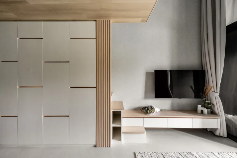 Modern minimalist living room interior with TV.