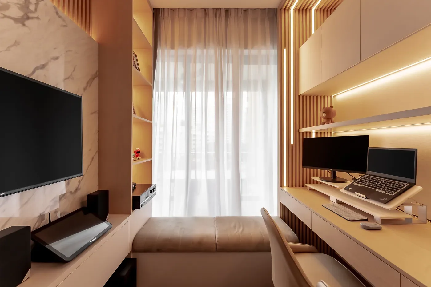 Modern home office with cozy design and warm lighting.