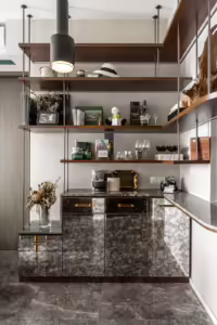 Custom-designed Silat Avenue cabinetry with marble countertops and mirrored doors.