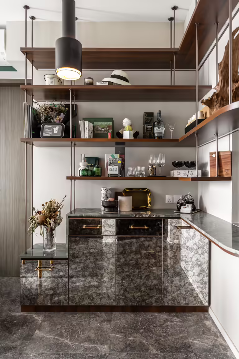 Custom-designed Silat Avenue cabinetry with marble countertops and mirrored doors.