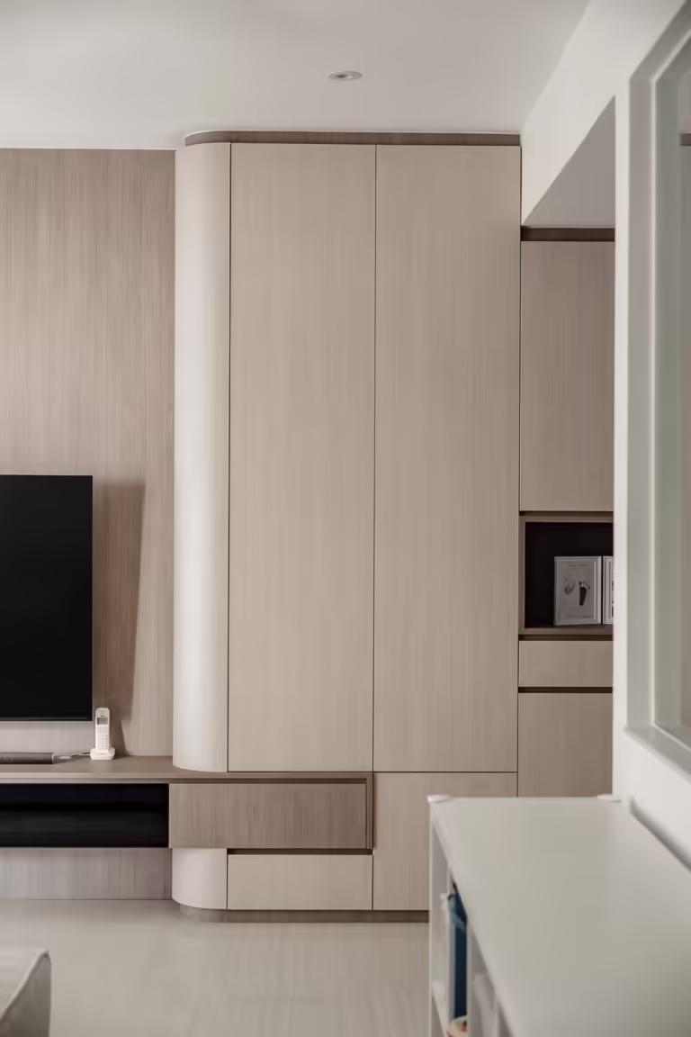 Modern minimalist living room with built-in cabinetry at 13 Anchorvale Cres.