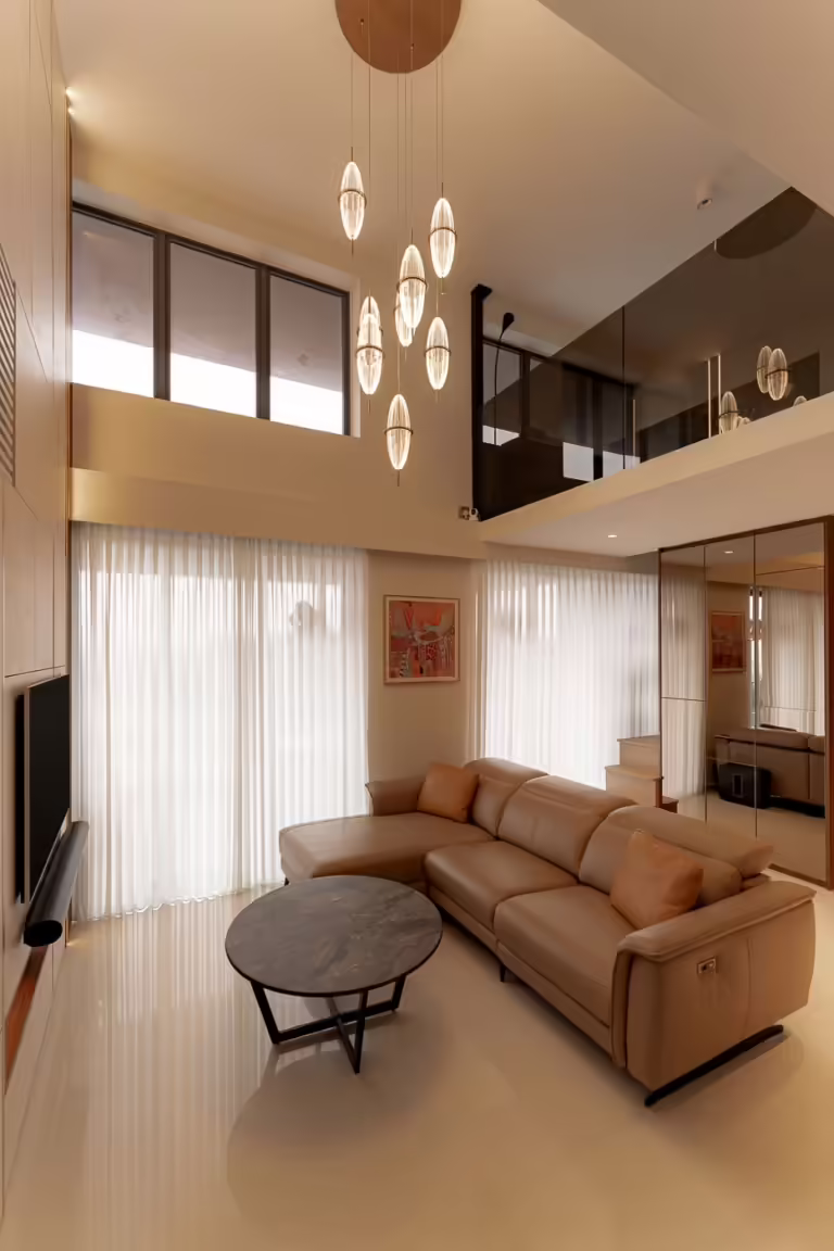 Modern living room in Serangoon North with leather sectional sofa and chandelier.