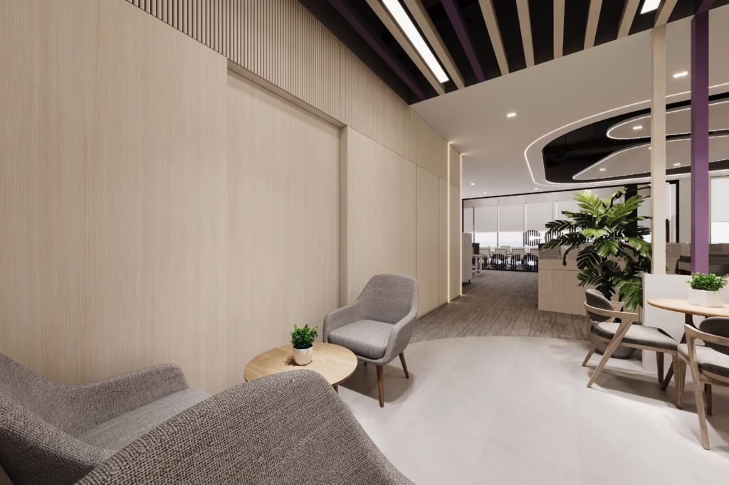 Modern office waiting area with comfortable seating and plants