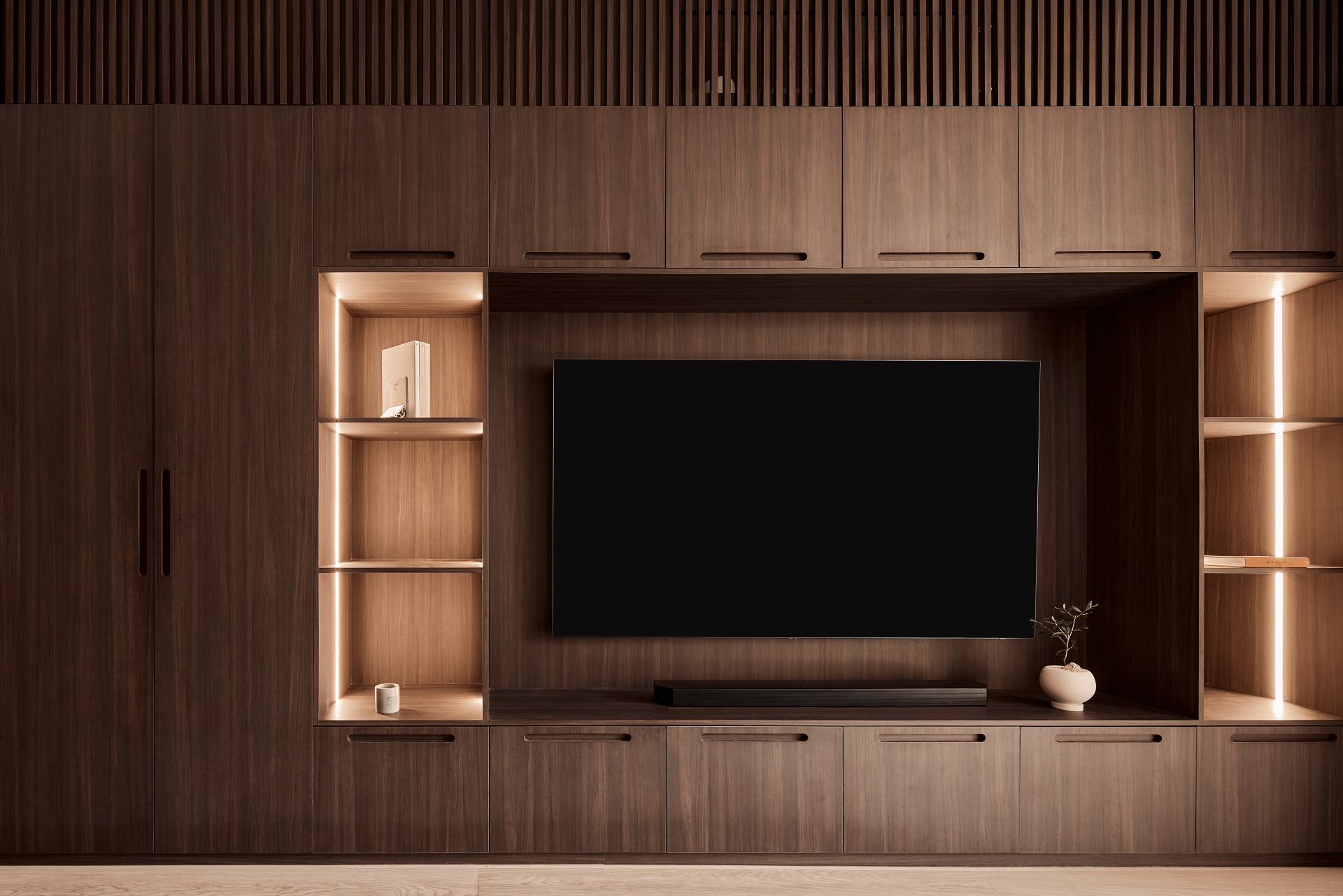 Walnut TV wall at Blk 77 Park East designed by IS Design Studio