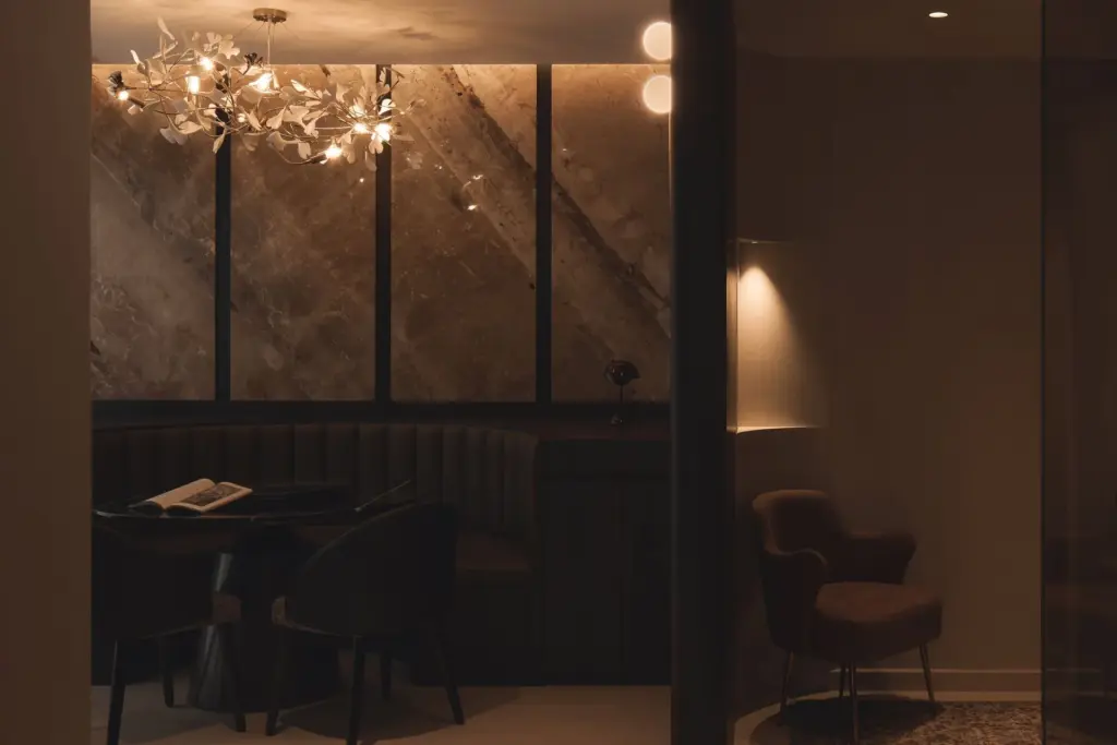 Cozy dimly-lit dining area with modern decor.